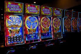 Live dealer at Speed Baccarat table shuffling six-deck shoe